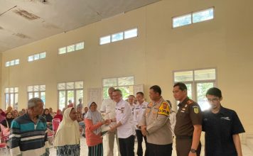 Polres Pagar Alam Kawal Pendistribusian Bantuan Cadangan Beras.